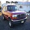 1995 Ford Bronco - Tiny avatar-sized image of a red two-door Ford Bronco with a dark hardtop, photographed from the front-right three-quarter with its chrome…