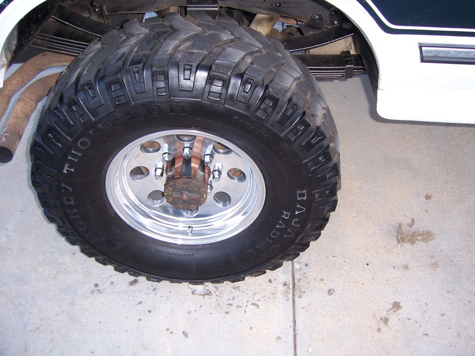 Mickey Thompson Baja Radial mud tire on polished wheel with exposed hub