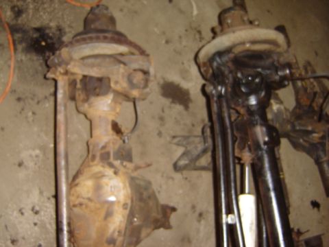 1992 Ford Bronco - Two front axle assemblies are shown, one appears to be a Dana 60.