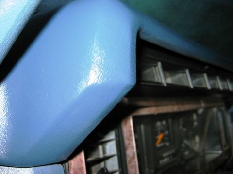 1985 Ford Bronco - Close-up view of a blue dashboard cover, obscuring most of the interior details.