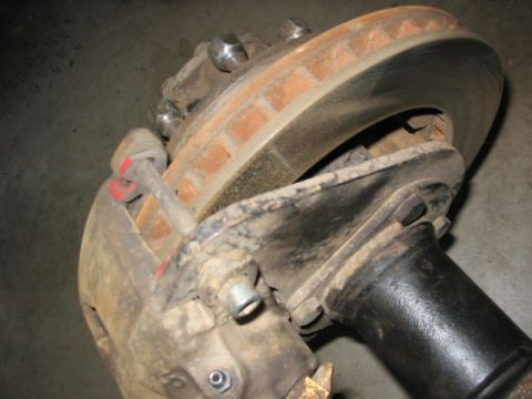 1995 Ford Bronco - 3/8" custom caliper mounting plate by Jim H. 3/4T chevy disc brake setup. Plan to use exact same up front.