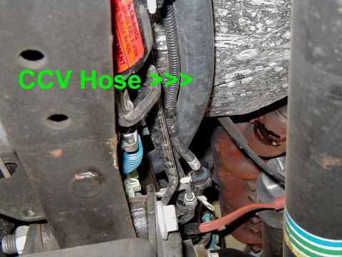 2002 Ford Excursion - CCV hose labeled with green text, showing engine components and undercarriage.