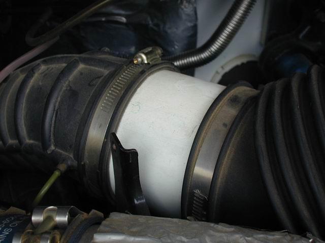 4" piece of PVC pipe in place of the stock fume collector unit(Photo author unknown)