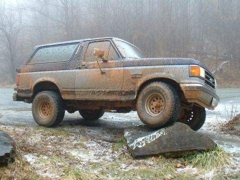 1991 Ford Bronco - This 1991 Ford Bronco is covered in mud after driving off-road.