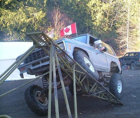 1984 Ford Bronco II - This 1984 Ford Bronco II is positioned on a metal ramp, with another SUV visible in the background.