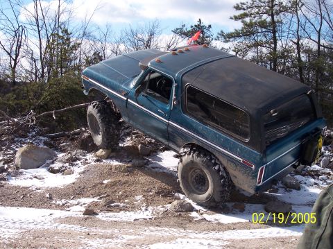 1995 Ford Bronco - This 1978 Ford Bronco navigates a challenging off-road course with large tires and a lifted suspension.