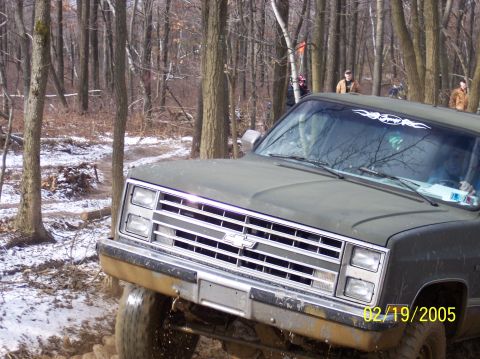1995 Ford Bronco - A Chevrolet truck navigates a snowy, wooded trail on February 19, 2005.