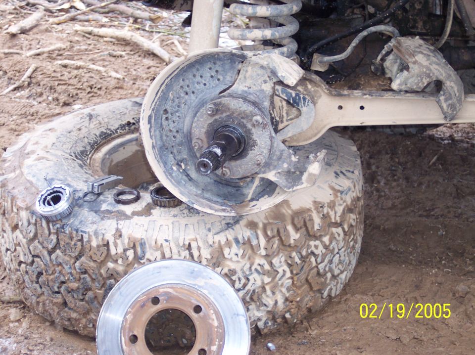 Disassembled wheel hub and brake rotor with date stamp 02/19/2005