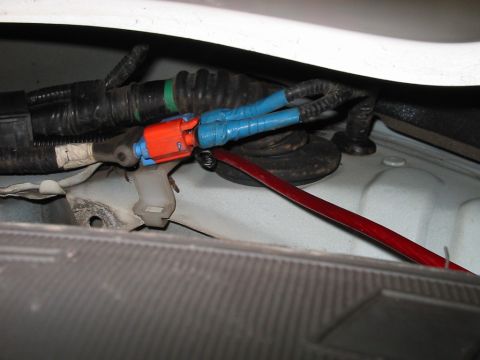 1994 Ford Probe - Wiring harness detail with blue tape and a red wire visible.