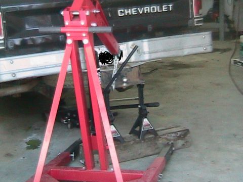 1981 Chevrolet C/K Pickup - Engine hoist positioned near the rear of a 1981 Chevrolet C/K Pickup truck.