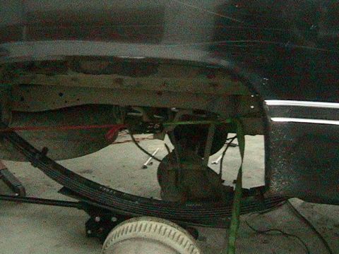 1981 Chevrolet C/K Pickup - Close-up of the rear axle and leaf spring suspension on a 1981 Chevrolet C/K Pickup.