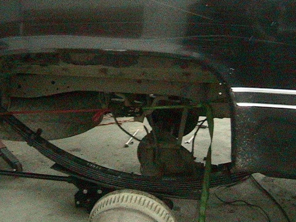1981 Chevrolet C/K Pickup rear axle with leaf springs and suspension components visible