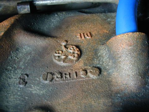 1968 Ford Mustang - Engine part with visible casting marks and stamped numbers, not identifiable to a specific year or model.