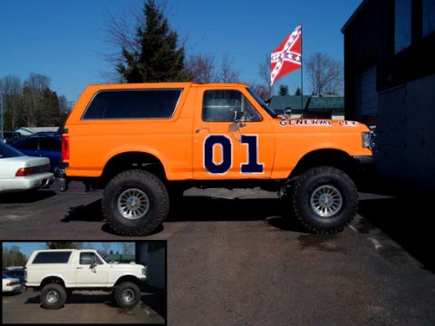 1993 Ford Bronco - Orange 1993 Ford Bronco modified to resemble the General Lee, with "01" on the door and a Confederate flag flying.