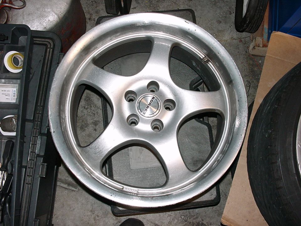 Borbet alloy wheel with five spokes and a silver finish