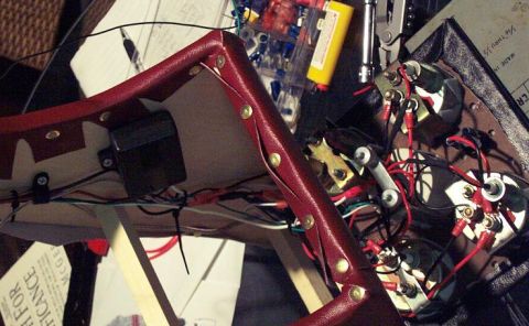 1985 Ford Crown Victoria LTD - Wiring and gauges are visible on a car interior part with red leather trim.