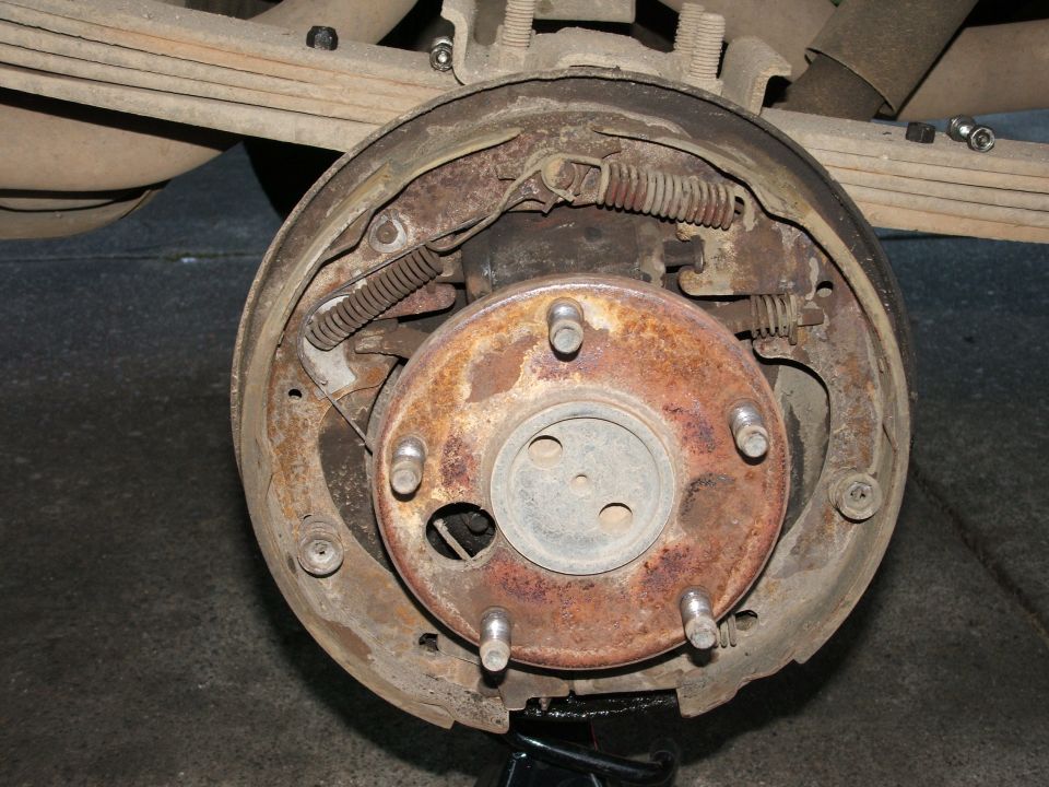 Leaky axel seal. and some rust.