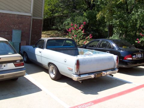 1969 Ford Ranchero - Left rear view parked in the lot.