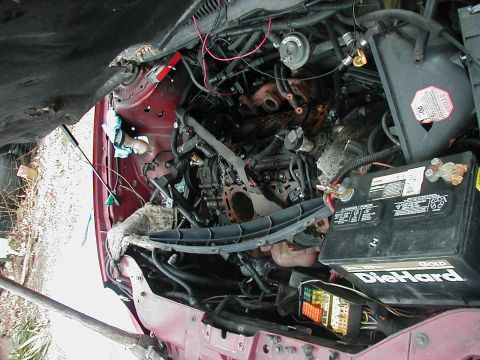 1997 Ford Taurus - Engine bay components including a DieHard battery and fuse box are visible in this photo.