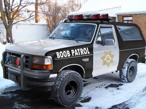 1993 Ford Bronco - This 1993 Ford Bronco has been customized with police-style markings and emergency lights.