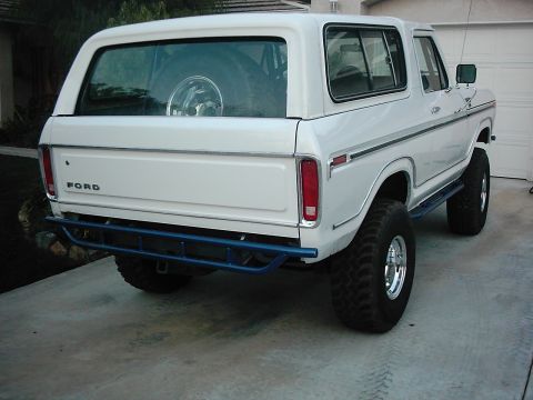 1978 Ford Bronco - This 1978 Ford Bronco is viewed from the rear, showing its distinctive body style and a blue aftermarket bumper.