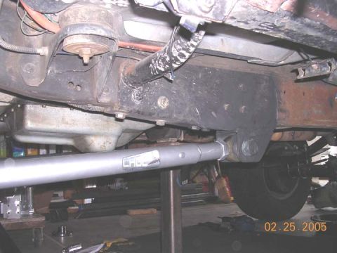 1994 Ford Bronco - drivers side. The cage arms mounted about 2" further back from where my other arms were, so I cut off all the old mounts below the frame. t…