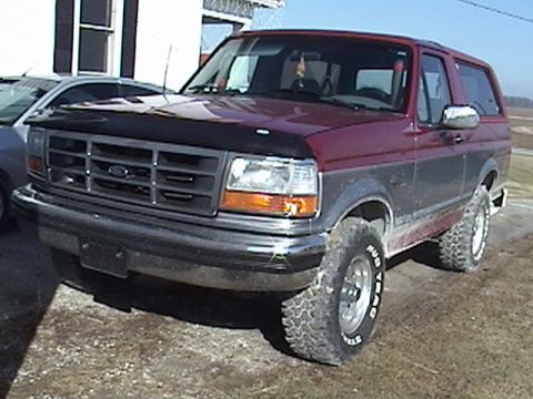 1994 Ford Bronco - This Ford Bronco has a two-tone paint scheme and off-road tires.
