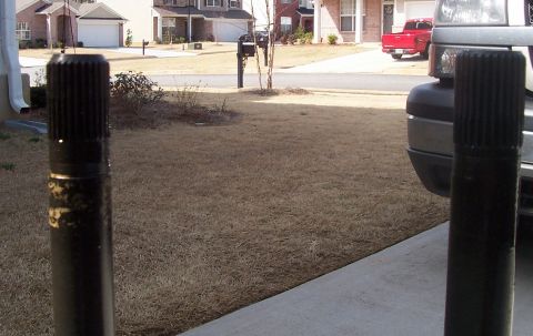 1967 Pontiac Lemans - Two drive axles are shown in the foreground, with vehicles in the background.