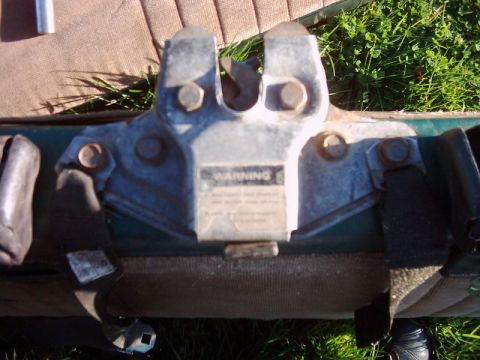 1978 Ford Bronco - Trailer hitch mechanism with warning label and straps visible.