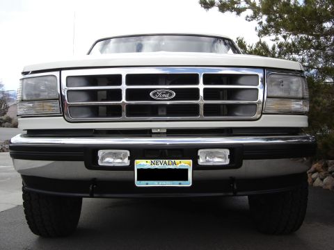1995 Ford Bronco - Front view of a 1995 Ford Bronco, its distinctive grille and headlights.