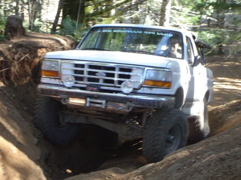 1989 Ford Bronco - This 1989 Ford Bronco is tackling a challenging off-road trail, as indicated by the decal on its windshield.