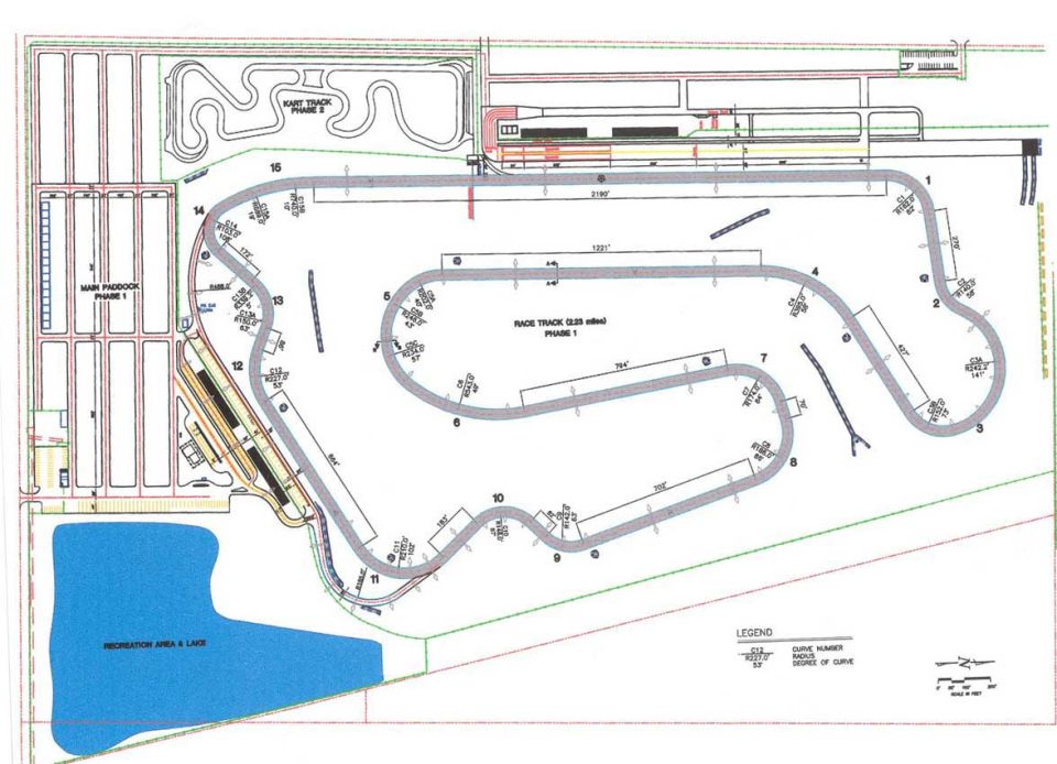Race track facility site plan with road course, paddock, lake, and curve-radius legend