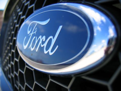 2000 Ford Crown Victoria - The iconic Ford emblem is shown on the vehicle's grille.