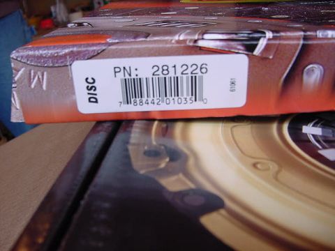 1995 Ford Bronco - A part is shown in its packaging, labeled with a part number and barcode.