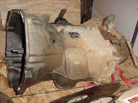 1995 Ford Bronco - A transmission assembly is shown, likely removed from a vehicle for repair or replacement.