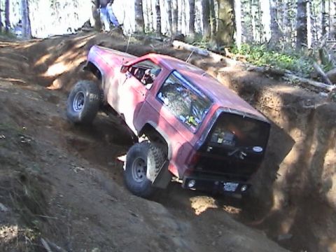 1994 Ford Explorer - This modified SUV navigates a challenging off-road trail.