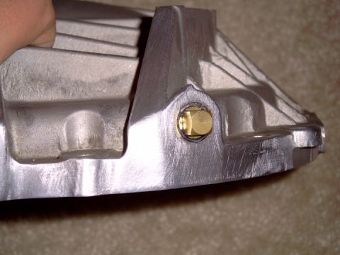 1991 Ford Bronco - The vent hole on the Explorer is on the cover. Taped the hole with a 1/4" NPT 18 tooth Tap and sealed it with a brass plug and blue thread…