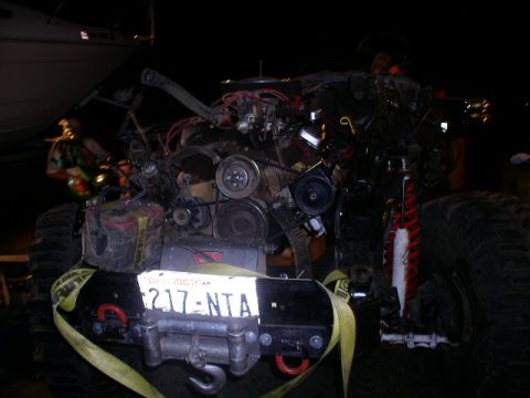 1979 Ford Bronco - Front view of an off-road vehicle's engine and winch assembly, with a Washington license plate.