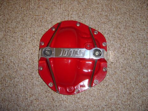 1978 Ford Bronco - A red differential cover with the DTS logo is shown against a carpeted background.