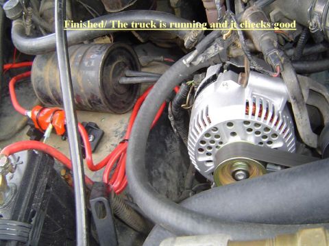 1993 Ford Bronco - The engine bay shows an alternator, battery, and various hoses and wires. Text indicates the vehicle is running well.