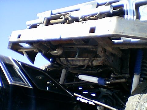 1979 Ford Bronco - Modified 1979 Ford Bronco undercarriage shows custom bumper and suspension upgrades.