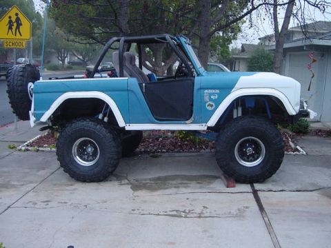 1971 Ford Bronco - 38's sitting in driveway