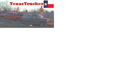 1989 Ford Bronco - Two vehicles are stuck in the mud, with people standing on them.