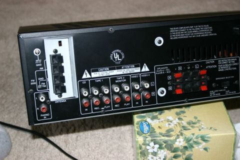 2003 Jeep TJ - Back of an audio receiver with connections for CD, tape, video, speakers, and antenna.