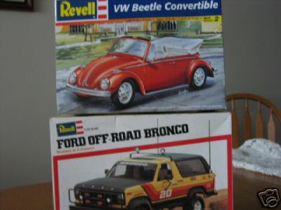 1990 Ford Bronco - Sales packaging box art for Revell VW Beetle Convertible and Ford Off-Road Bronco model kits.