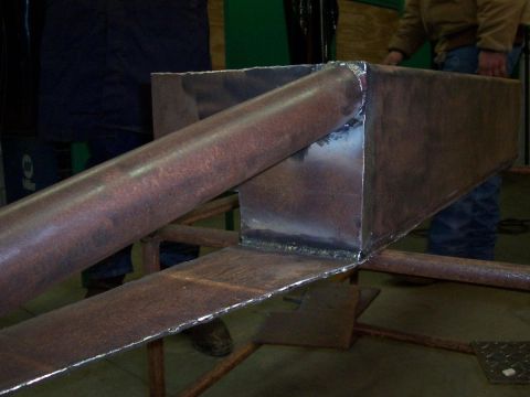 1989 Ford Bronco - A close-up view of a custom-fabricated steel component, likely for a vehicle modification project.