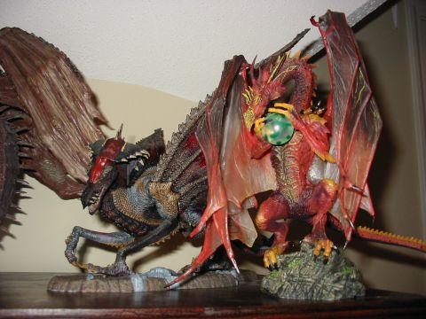 1991 Ford Bronco - Dragon figurines are displayed on a shelf, with one holding a green orb.