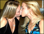 1992 Ford Bronco - A close-up of two women sharing a kiss.