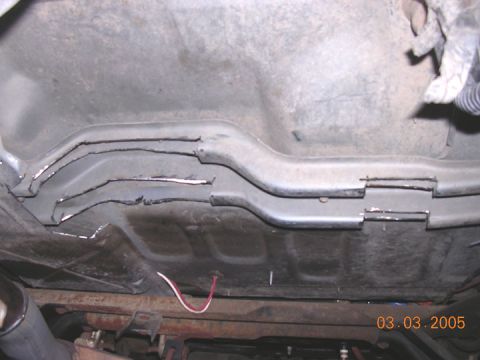 1994 Ford Bronco - I ended up without using a body lift, but notched the seatbelt bracket like this