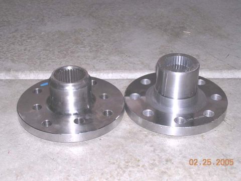 1994 Ford Bronco - Im using WFO flange (on left and 1/2" shorter) in the rear, and a Highangle flange(on right) in the front for extra xmember clearance